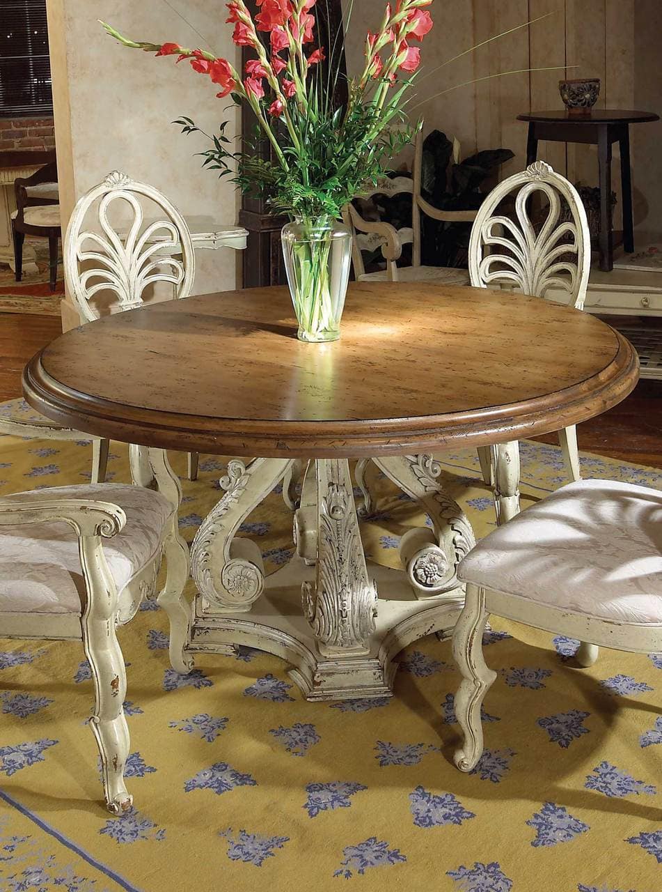 Round Valencia Dining Table by Habersham in a dining room
